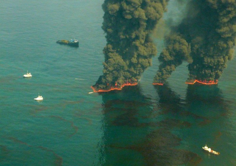 Controlled burn of oil on water in the gulf.